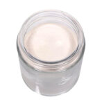 Vivimu CBDa Isolate — premium hemp-derived CBDa powder viewed from above in a clear glass jar, showcasing fine, smooth cannabinoid crystals.
